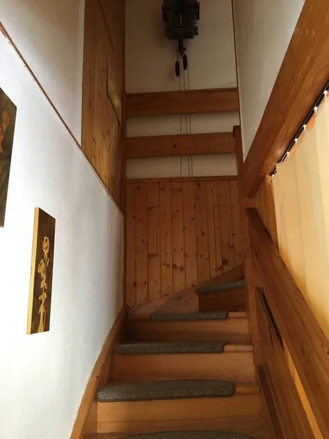 Wooden staircase leading upstairs