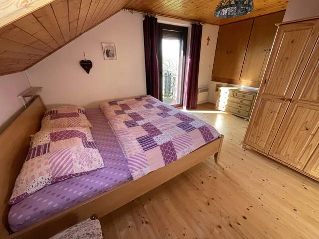 Double bed in the attic bedroom